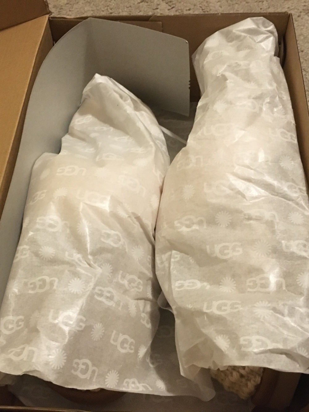 Selling knitted cream cozy slipper Uggs  size 7